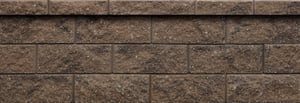 Rustic: <a href="https://hub.countymaterials.com/products/tribute-splitface-wall-system">Tribute Splitface Wall System</a> in Canyon Brown with <a href="https://hub.countymaterials.com/products/wall-pillar-caps">Splitface Rectangle Cap</a> in Canyon Brown